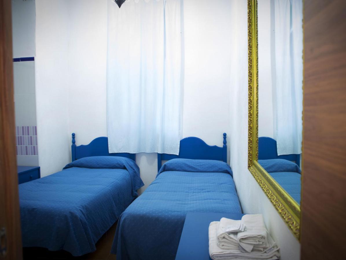 Pension Santa Maria La Blanca Севиля Стая снимка